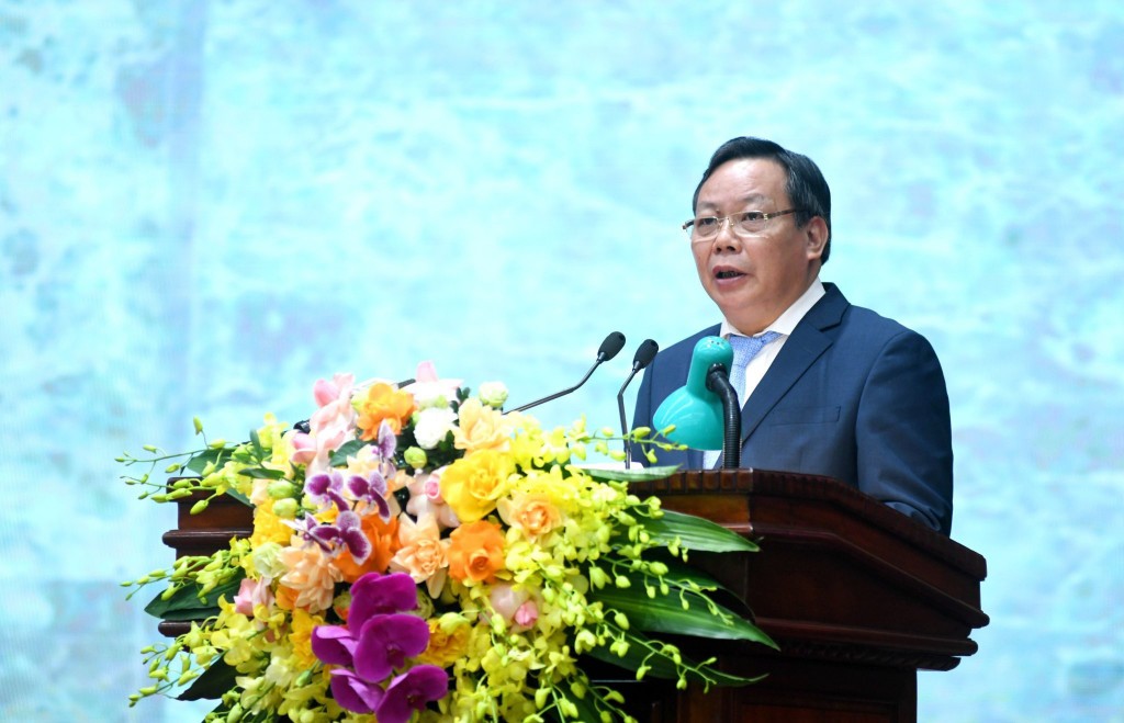 	Phó Bí thư Thành ủy Nguyễn Văn Phong phát biểu tham luận tại Hội nghị Ảnh: Viết Thành