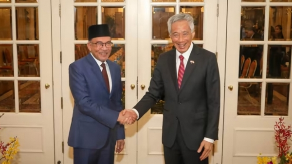 Thủ tướng Singapore Lý Hiển Long chào đón người đồng cấp Malaysia Anwar Ibrahim tại Istana ngày 30.1.2023 - Nguồn channelnewsasia
